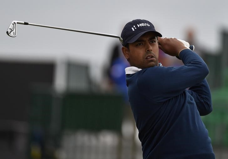 © Reuters. Anirban Lahiri of the India watches his tee shot during a practice round ahead of the British Open Championship at the Royal Liverpool Golf Club in Hoylake