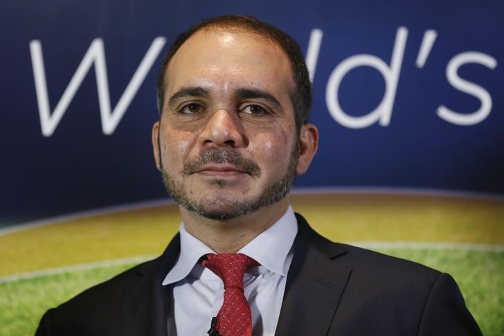 © Reuters. Jordan's Prince Ali Bin Al-Hussein, FIFA's Asian vice president and chairman of the Jordan Football Association, poses for photographers after a news conference in central London