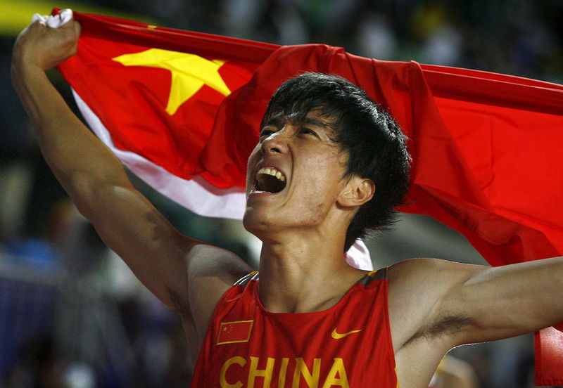 © Reuters. File photo of China's Liu celebrating after winning the men's 110 metres hurdles final at the 11th IAAF World Athletics Championship in Osaka