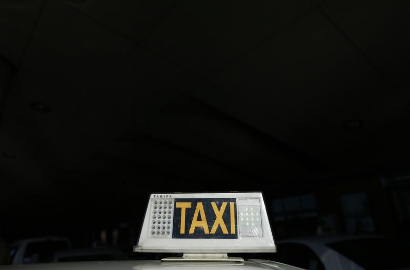 © Reuters. خدمة أمريكية لسيارات الأجرة تطلب رفض دعوى بشأن اغتصاب في نيودلهي