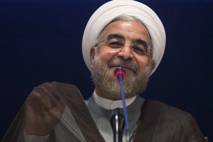 © Reuters. Iran's President Hassan Rouhani smiles while replying to a question during a news conference on the sidelines of the 69th United Nations General Assembly at United Nations Headquarters in New York