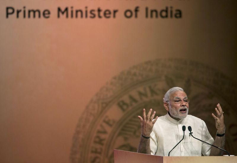 © Reuters. India's Prime Minister Narendra Modi speaks during an event on financial inclusion in Mumbai 