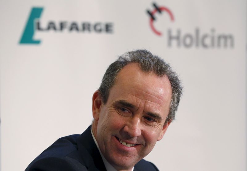 © Reuters. Future CEO Olsen of the new merged entity LafargeHolcim smiles during a news conference in Zurich