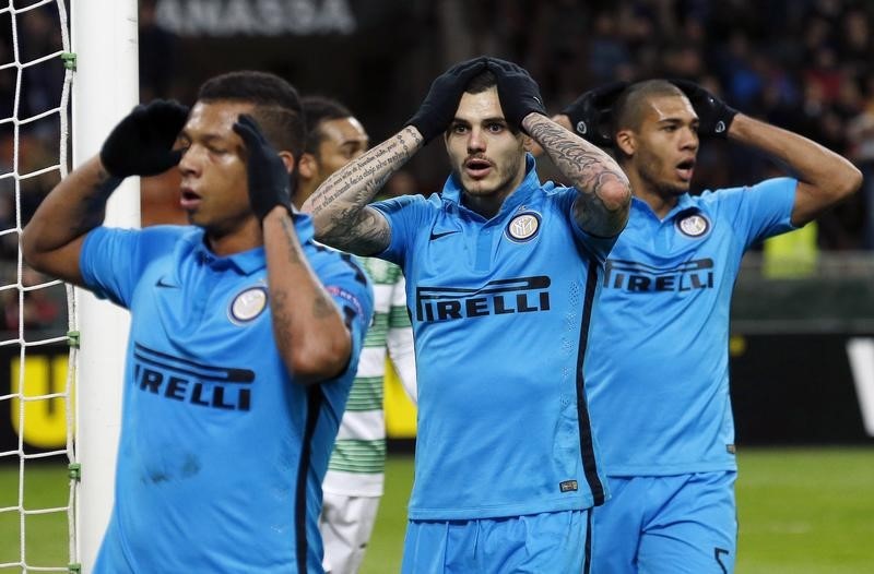 © Reuters. Inter Milan's Icardi, Jesus and Guarin react during their Europa League round of 32 second leg soccer match against Celtic at the San Siro stadium in Milan