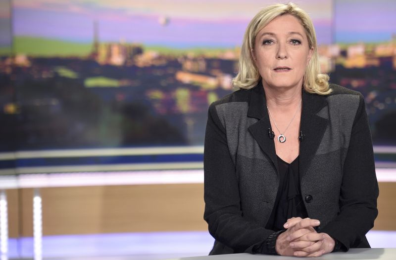 © Reuters. France's far-right National Front political party leader Le Pen waits before TF1 television evening news programme in Boulogne-Billancourt