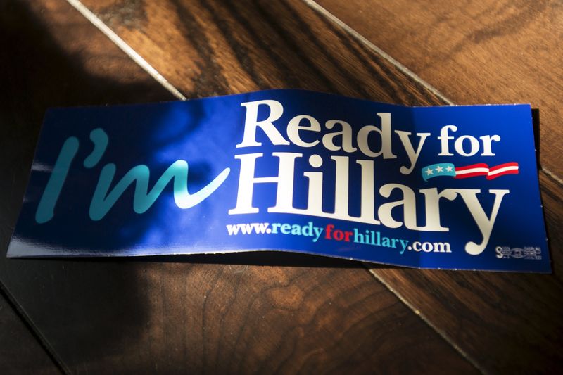 © Reuters. An "I'm Ready for Hillary" sticker lays on a table during the "Ready for Hillary" rally in Manhattan, New York 