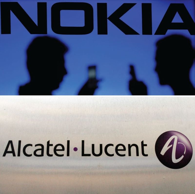 © Reuters. NOKIA ET ALCATEL-LUCENT ANNONCENT NÉGOCIER UNE FUSION