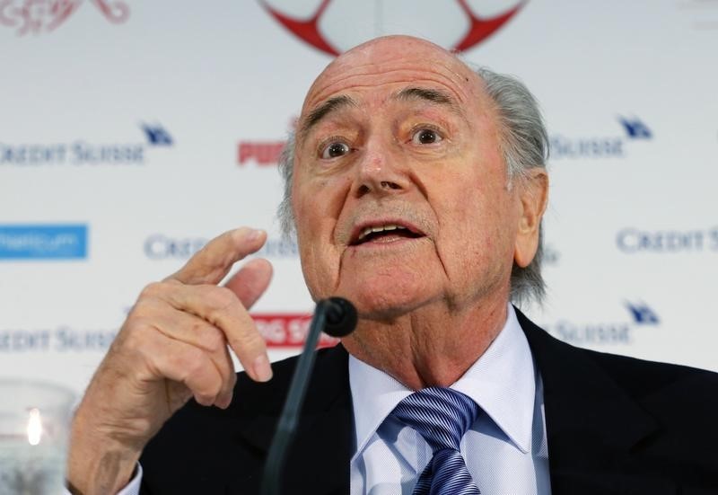 © Reuters. FIFA president Blatter gestures during a news conferece after the Swiss women's soccer A team qualifyed for the FIFA Women's World Cup, in Luzern