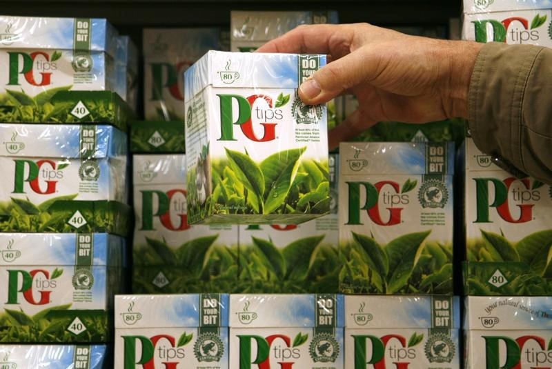 © Reuters. A shopper picks up a box of PG Tips tea bags at a Sainsbury's supermarket in London