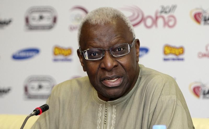 © Reuters. IAAF President Diack attends a news conference for the Diamond League athletics meet in Doha