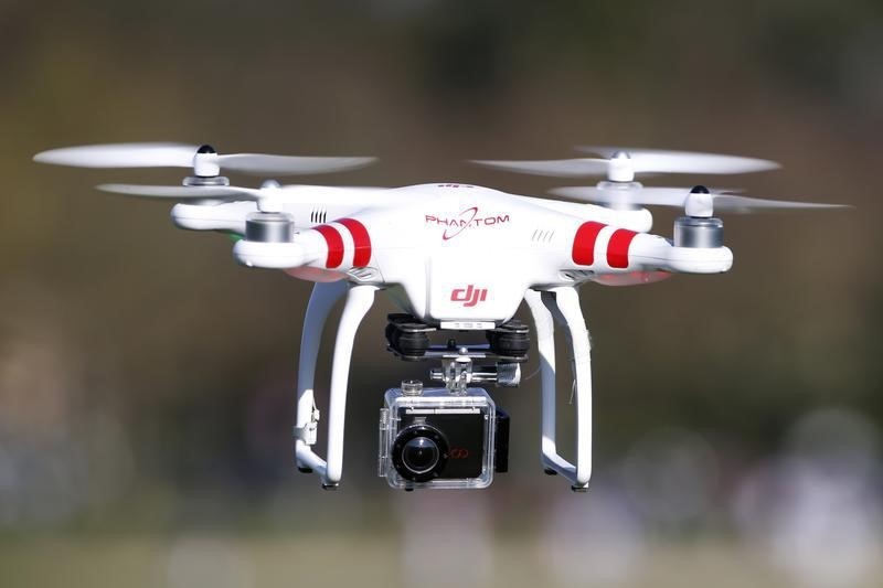 © Reuters. A Phantom drone by DJI company, equipped with a camera, flies during the 4th Intergalactic Meeting of Phantom's Pilots in an open secure area in the Bois de Boulogne, western Paris