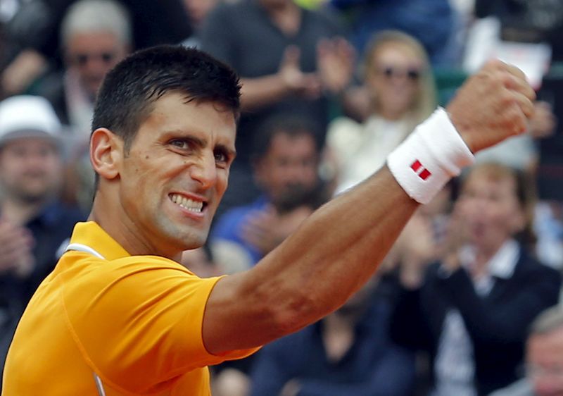 © Reuters. Djokovic of Serbia reacts after defeating Nadal of Spain during their semi-final match at the Monte Carlo Masters in Monaco