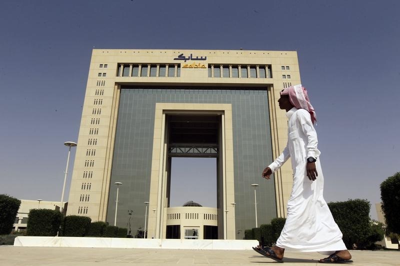 © Reuters. A man walks past the headquarters of Saudi Basic Industries Corp in Riyadh