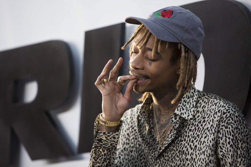 © Reuters. Rapper Khalifa poses at the premiere of "Furious 7" at the TCL Chinese theatre in Hollywood