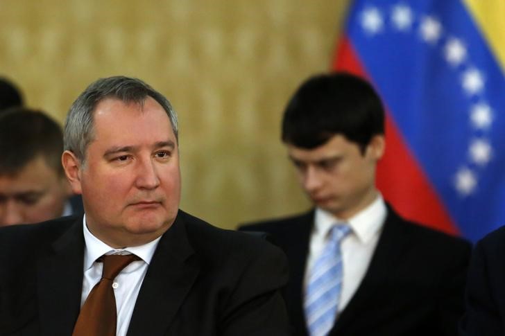 © Reuters. Russia's Deputy Prime Minister Dmitry Rogozin attends a meeting with Venezuela's Foreign Minister Rafael Ramirez in Caracas
