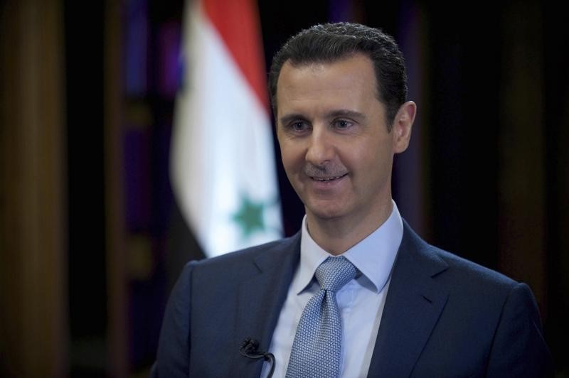 © Reuters. Syria's President Bashar al-Assad is seen during the filming of an interview with the BBC, in Damascus