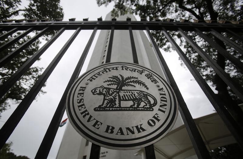 © Reuters. The Reserve Bank of India seal is pictured on a gate in Mumbai