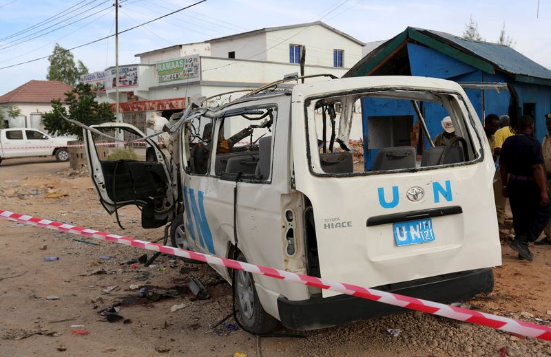 © Reuters. A U.N. van is seen damaged by an improvised explosive device outside the U.N. compound in Garowe