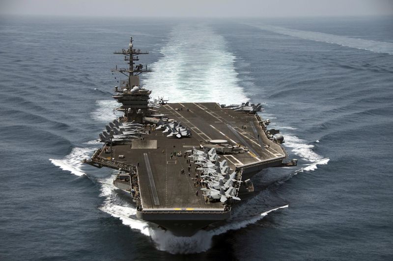 © Reuters. The aircraft carrier USS Theodore Roosevelt operates in the Arabian Sea conducting maritime security operations