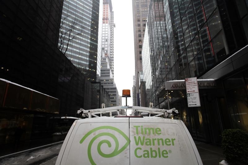 © Reuters. The Time Warner Cable logo is displayed on the back of a van in New York