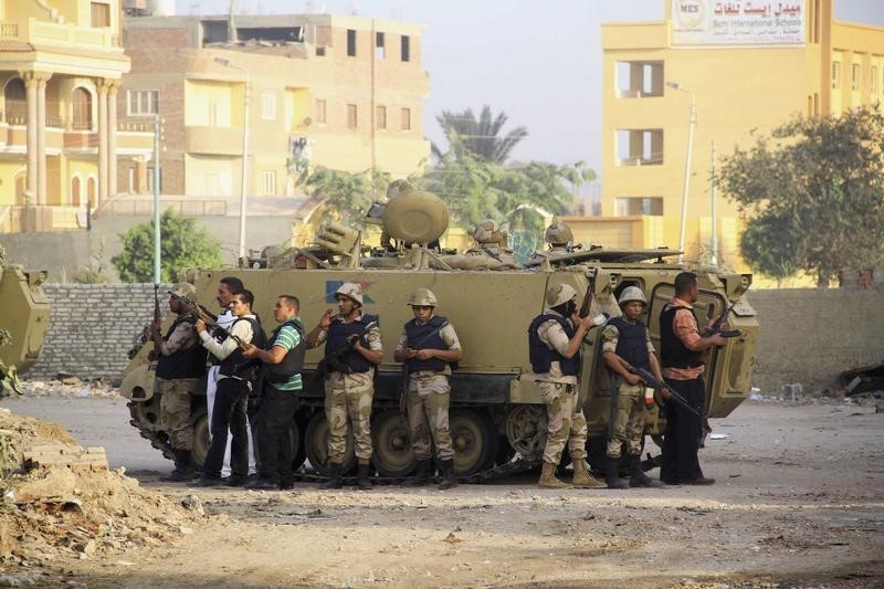 © Reuters. كرداسة.. مثال حي على ما تواجهه مصر في معركتها مع التشدد الإسلامي