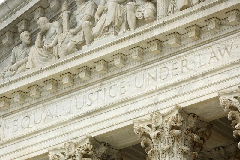 © Reuters. The phrase "Equal Justice Under Law" adorns the west entrance to the U.S. Supreme Court building in Washington