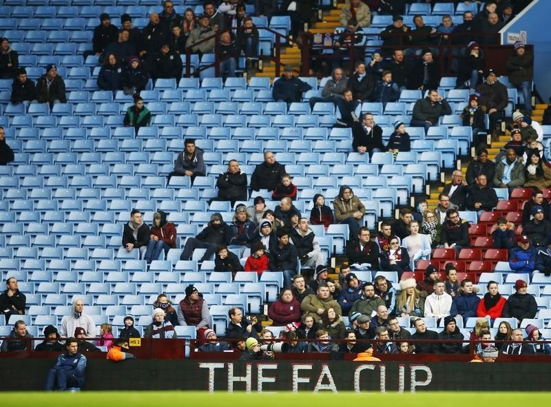 © Reuters. Empty seats are seen during Aston Villa's FA Cup fourth round soccer match against Bournemouth at Villa Park in Birmingham