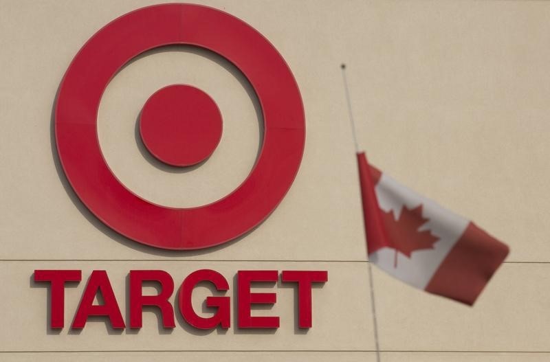© Reuters. A Canadian flag flies on a vehicle parked outside a Target store in Hamilton