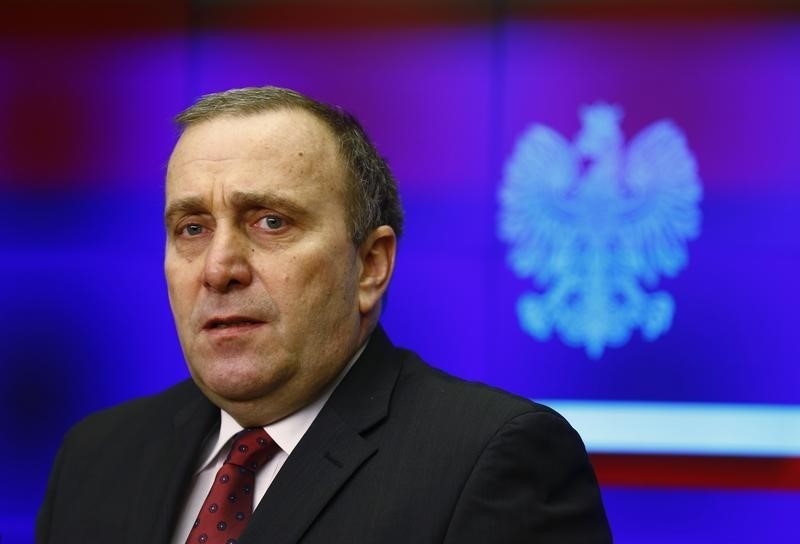 © Reuters. Poland's Foreign Minister Schetyna looks on as he listens questions during news conference after his meeting with Britain's Foreign Secretary Hammond at the Foreign Ministry in Warsaw