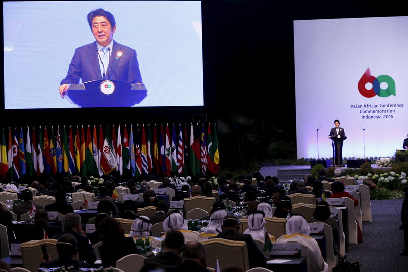 © Reuters. Japan's PM Abe delivers speech at plenary session during   Asian African Conference in Jakarta 