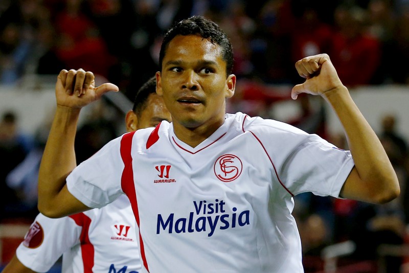 © Reuters. Sevilla's Carlos Bacca celebrates after scoring against Zenit St. Petersburg during their soccer match in Seville