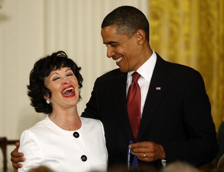 © Reuters. US President Obama laughs with entertainer Rivera as he presents her with the Medal of Freedom in Washington