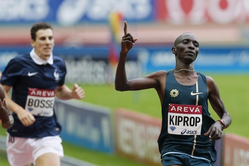 © Reuters. Kenya's Asbel Kiprop reacts after crossing the finish line of the men's 800m event at the Paris Diamond League meeting at the Stade de France Stadium in Saint-Denis, near Paris