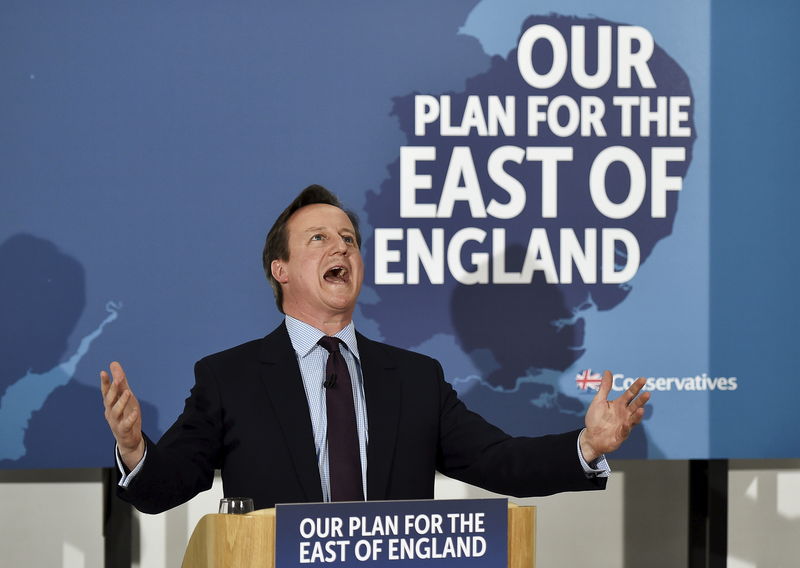 © Reuters. British PM Cameron speaks during a campaign visit in Frinton-on-Sea