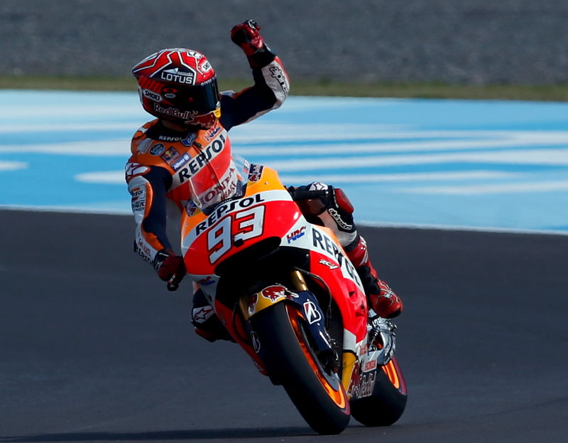 © Reuters. Marquez of Spain celebrates his pole position after the qualifying session at Argentina's MotoGP Grand Prix in Termas de Rio Hondo