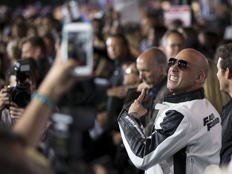 © Reuters. Cast member Diesel poses for fans at the premiere of "Furious 7" at the TCL Chinese theatre in Hollywood