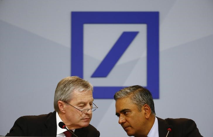 © Reuters. Jain and Fitschen, co-CEOs of Deutsche Bank, speak at a news conference in Frankfurt