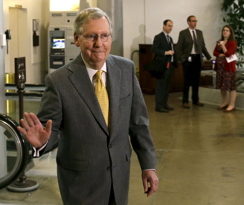 © Reuters. US Senate Miajority Leader McConnell walks to closed meetings with US Senators and Secretary of State Kerry on Iran nuclear negotiations in Washington 