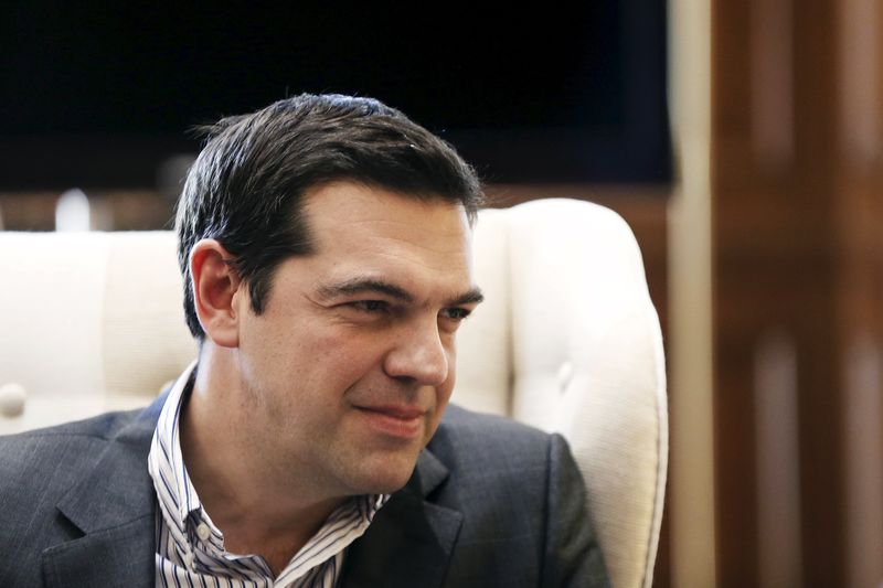 © Reuters. Greek PM Tsipras listens to Russian Gazprom CEO Miller during meeting in Athens 