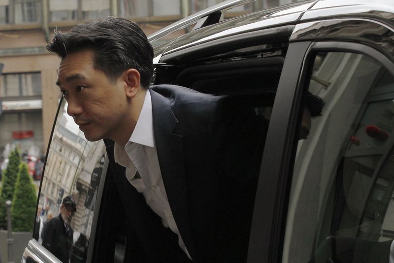 © Reuters. Taechaubol arrives at a hotel downtown in Milan 