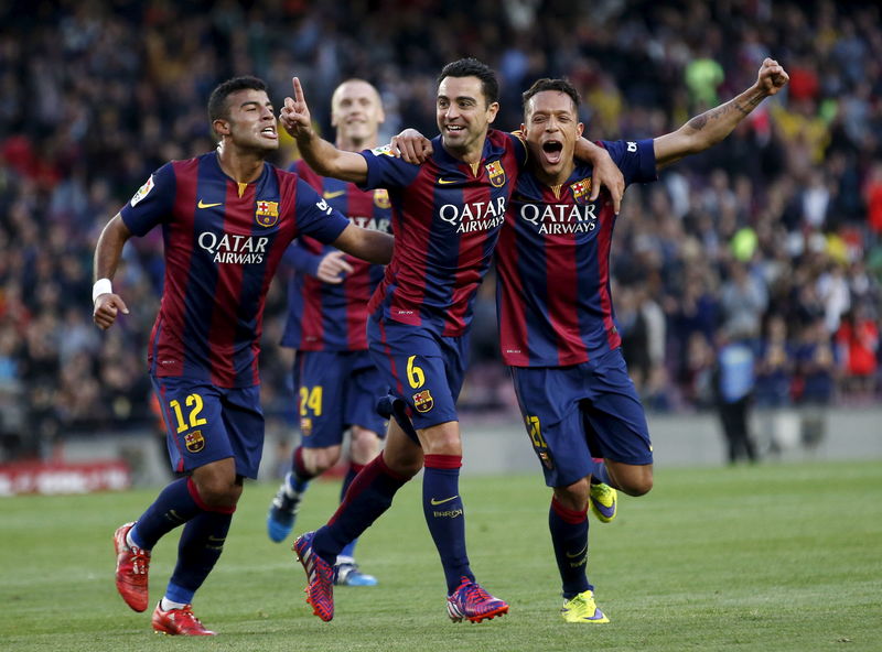 © Reuters. Jogadores do Barcelona comemoram gol contra Getafe