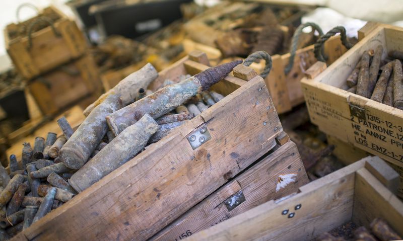 © Reuters. Recovered ammunition are seen in boxes at a police blasting ground in Berlin's Grunewald forest