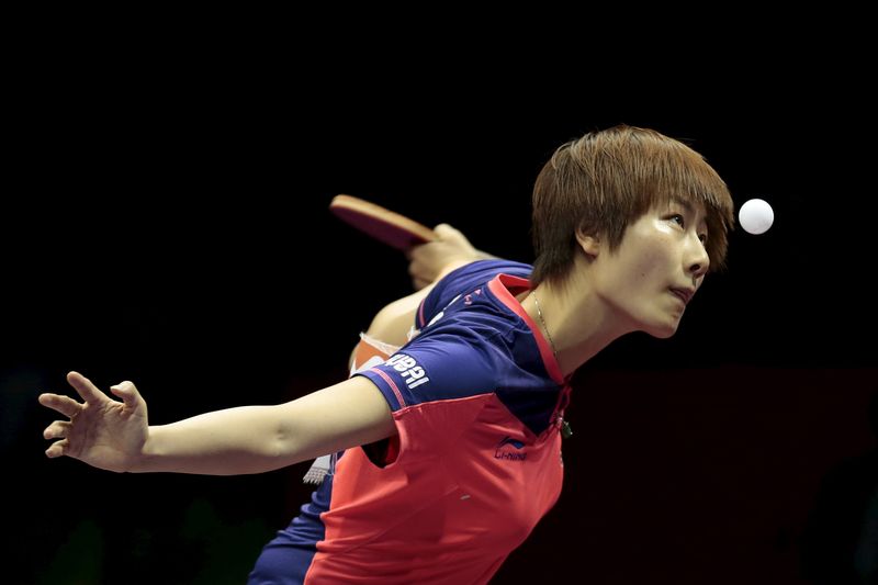 © Reuters. China's Ding Ning serves against her compatriot Liu Shiwen in the women's singles final table tennis match at the World Table Tennis Championships in Suzhou