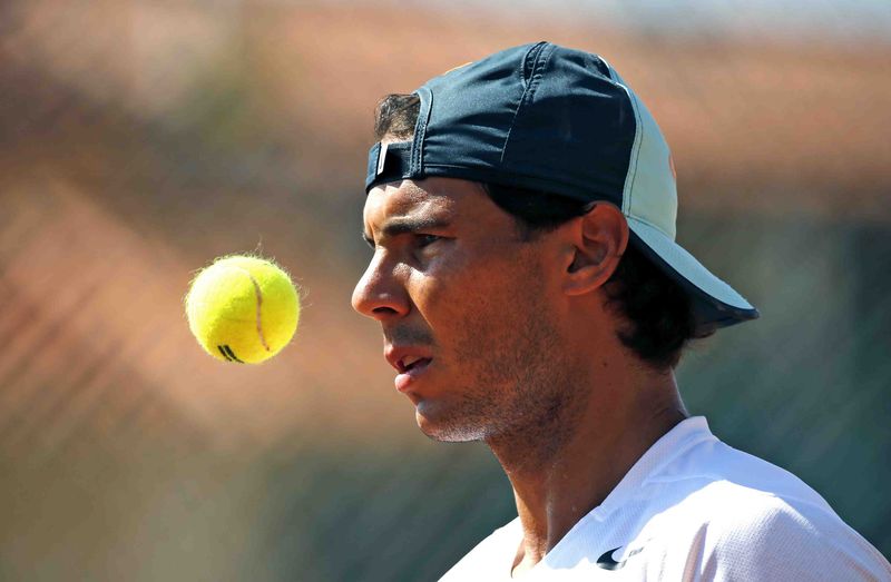 © Reuters. Rafael Nadal of Spain attends a training session at the Monte Carlo Masters in Monaco