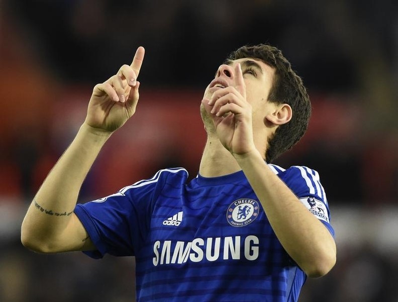 © Reuters. Chelsea's Oscar celebrates after scoring a goal against Swansea City during their English Premier League soccer match at the Liberty Stadium in Swansea