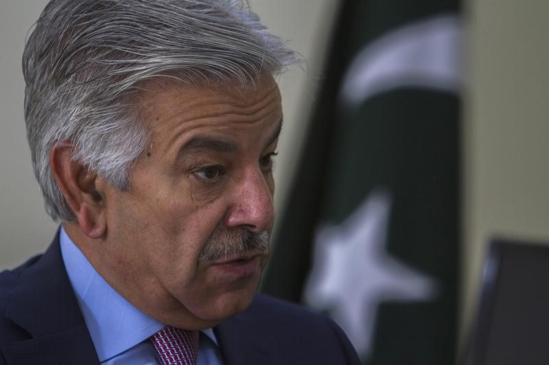 © Reuters. Pakistan's Defence Minister Asif speaks during an interview with Reuters at his office in Islamabad