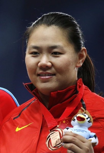 © Reuters. إعادة ذهبية ألعاب آسيا للصينية تشانغ متسابقة الاطاحة بالمطرقة