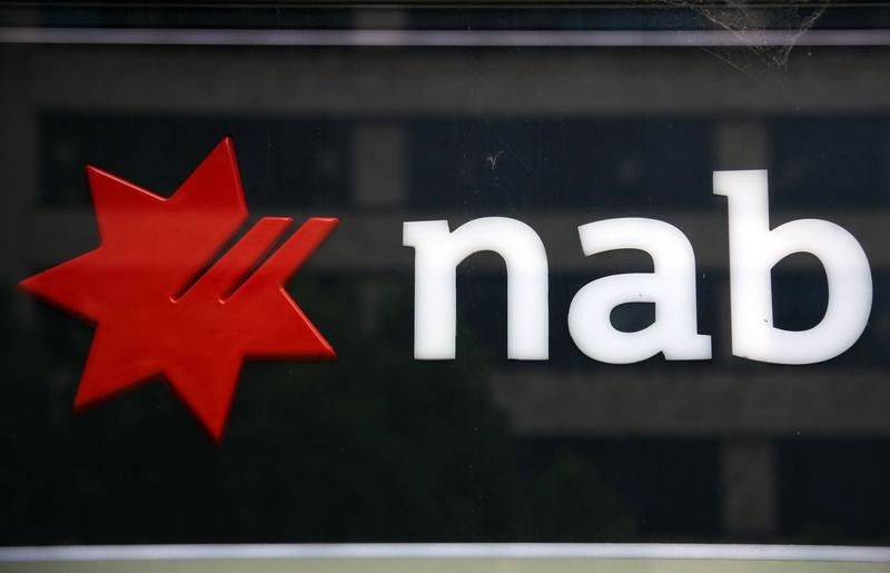 © Reuters. A National Australia Bank (NAB) sign can bes een above an ATM in central Sydney