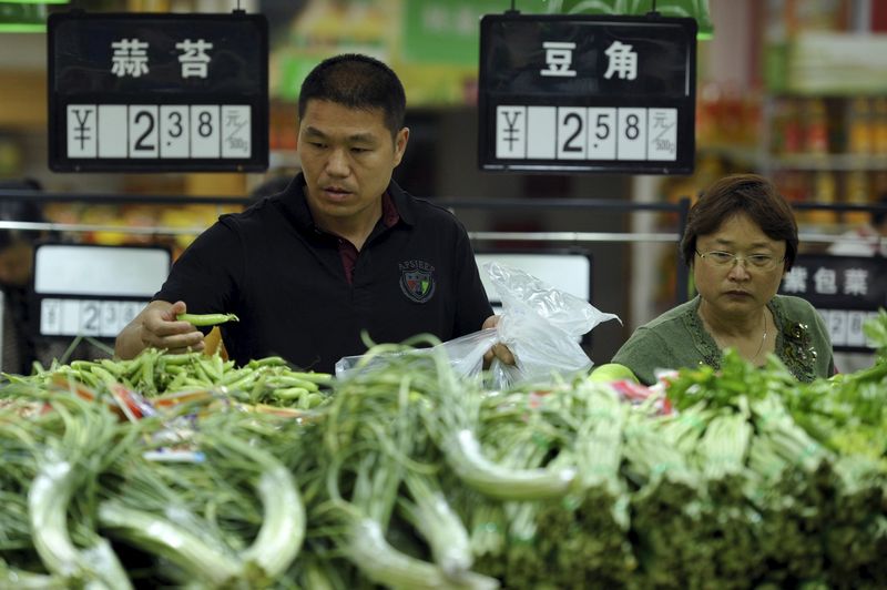 © Reuters. INFLATION PLUS FAIBLE QUE PRÉVU EN AVRIL EN CHINE