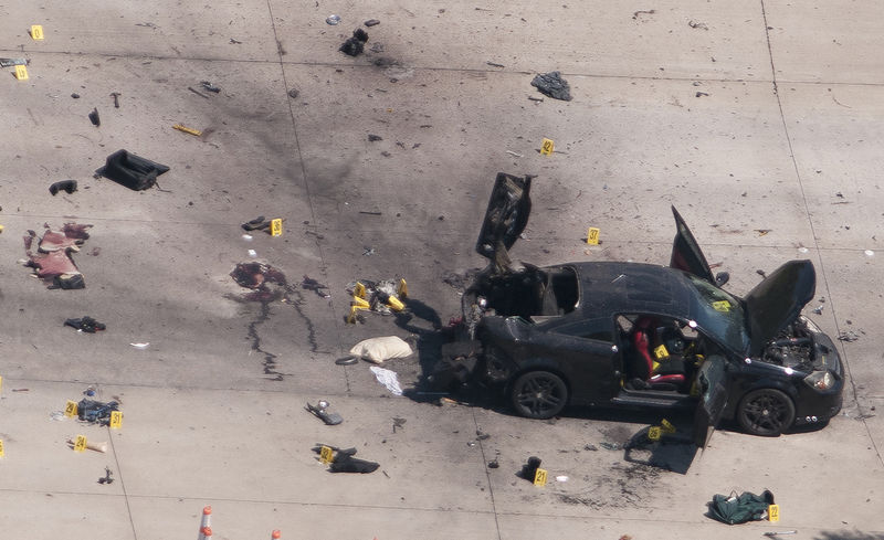 © Reuters. The car that was used the previous night by two gunmen is investigated by local police and the FBI in Garland